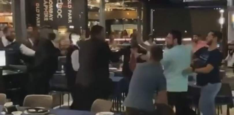 Homem manda champanhe para mulher casada e acaba causando pancadaria em bar veja video