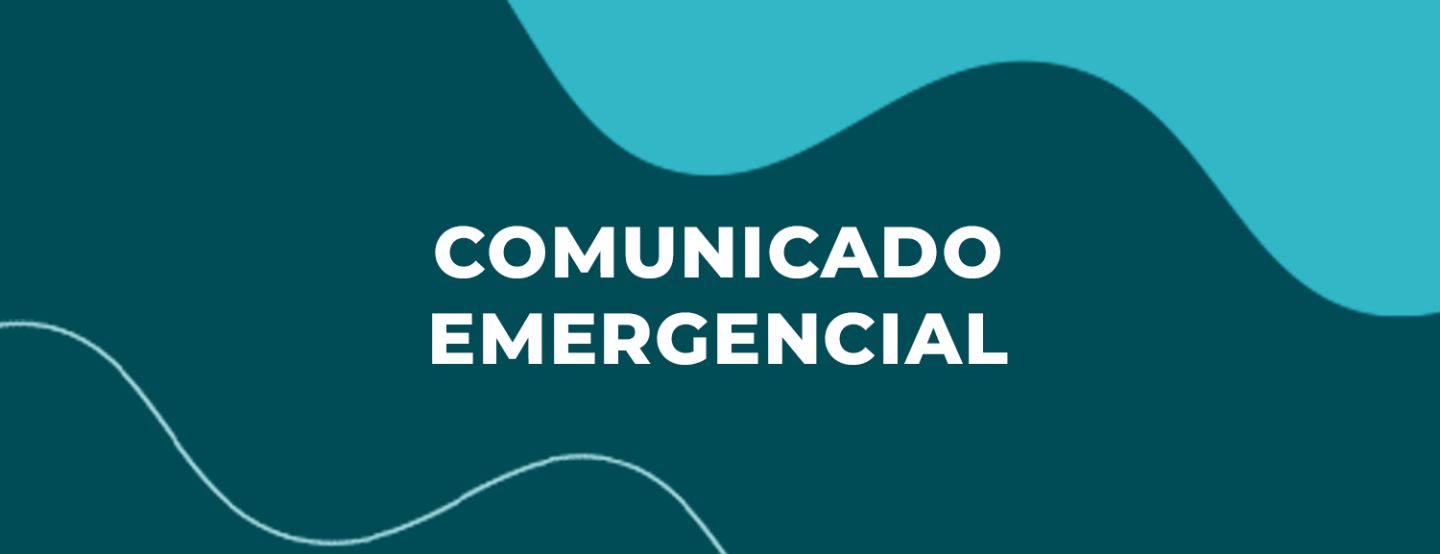 Arte com fundo em tons de azul-petróleo e a frase Comunicado Emergencial em letras brancas